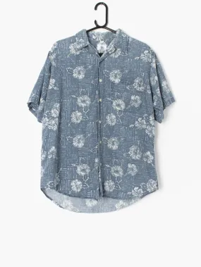 Mens vintage Hawaiian shirt with faded blue geometric and white floral pattern – Small / Medium