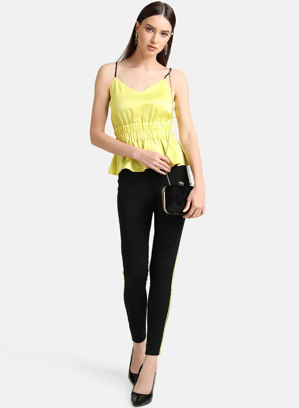 Sleeveless Strap Top With Elasticated Waist.