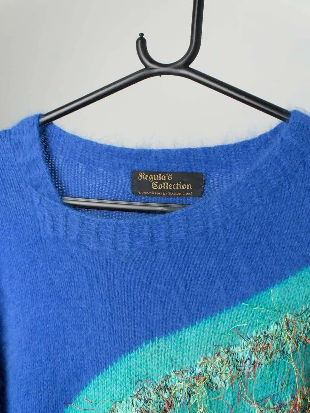 Vintage mohair jumper in electric blue with striped design and crazy rainbow tassels – Small / Medium